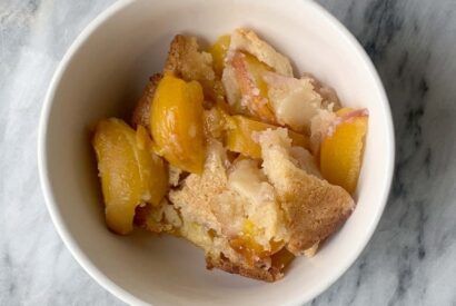 Thumbnail for A Tasty ‘Lazy’ Peach Cobbler Recipe Worth Trying