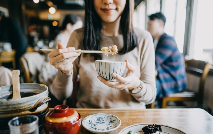 Woman eating Japanese food